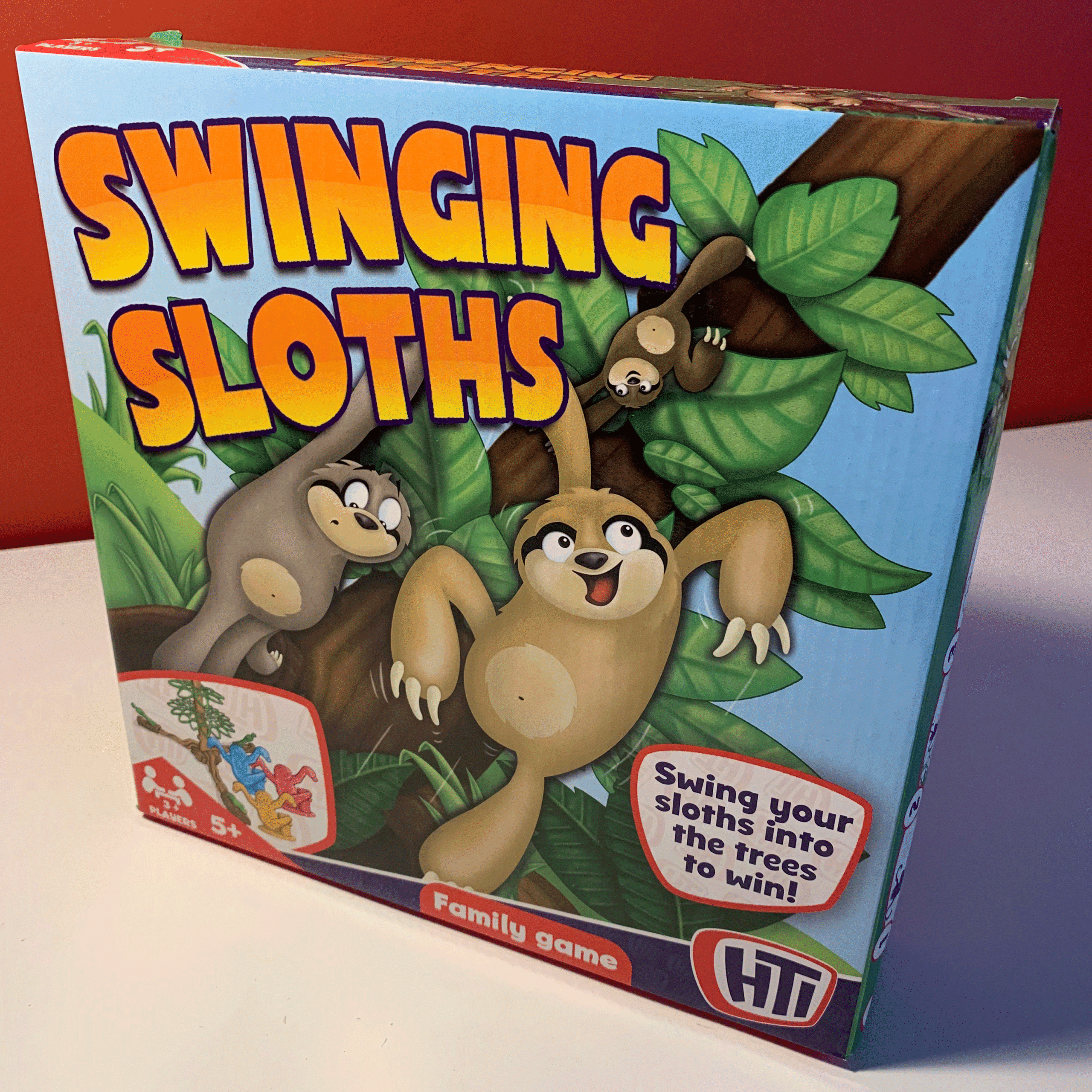 illustrated box top for swinging sloths game